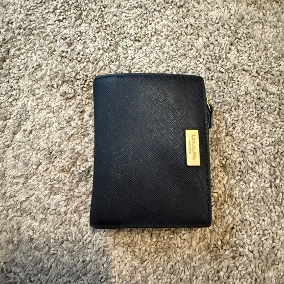 kate spade Handbags - Kate spade Black Textured Wallet with Gold Accent